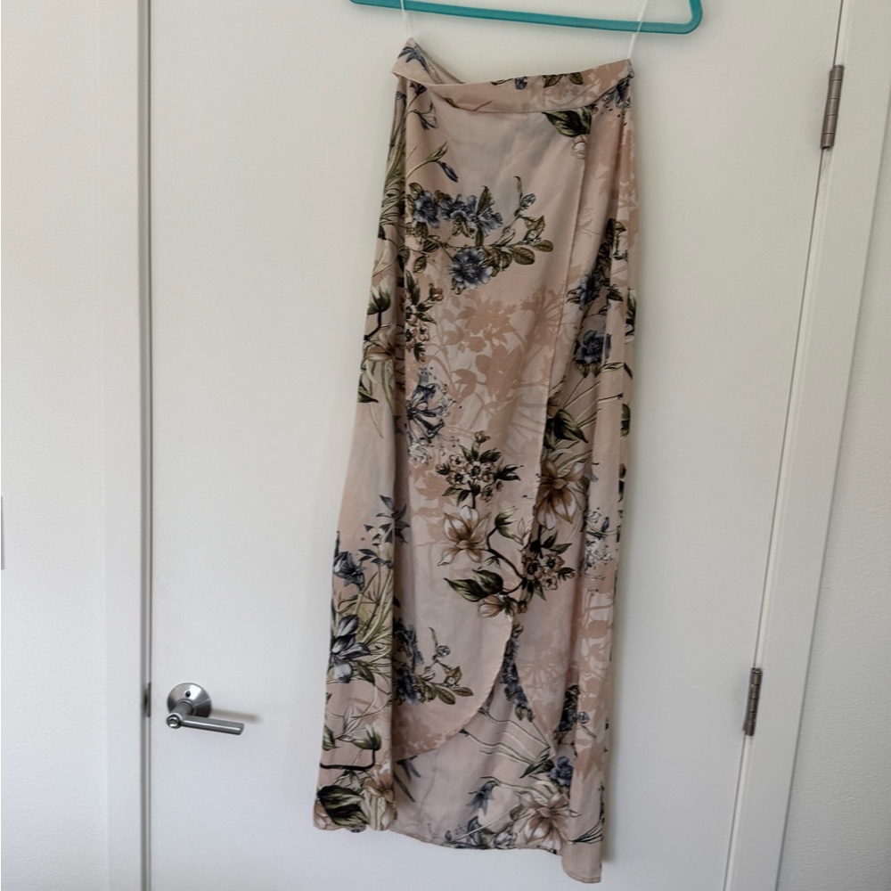 Set top and skirt has attached underwear, beige floral green size small